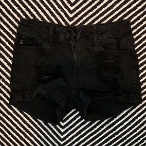 KanCan black jean shorts.